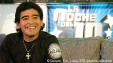 epa000504741 Argentinian former soccer star Diego Maradona smiles as he attends a press conference after the new TV Show La Noche del Diez (the night of the ten), conducted by the Argentinean soccer player and transmitted on Monday night 15 August 2005 by Canal Trece (channel 13) in Argentina. EPA/CEZARO DE LUCA