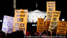 CORRECTS DATE FROM THURSDAY, JAN. 26 TO FRIDAY, JAN. 27 - Protesters gather in Lafayette Park outside the White House in Washington, Friday, Jan. 27, 2023, over the death of Tyre Nichols, who died after being beaten by Memphis police. (AP Photo/Andrew Harnik)