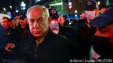 Israeli Prime Minister Benjamin Netanyahu visits the scene of a shooting attack in Neve Yaacov which lies on occupied land that Israel annexed to Jerusalem after the 1967 Middle East war January 27, 2023. REUTERS/Ronen Zvulun