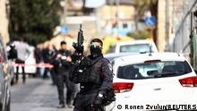 28.01.2023 *** Israeli security personnel work near a scene where a suspected incident of shooting attack took place, police spokesman said, just outside Jerusalem's Old City January 28, 2023. REUTERS/Ronen Zvulun