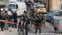 28.01.2023 *** Israeli security forces and emergency service personnel gather at a cordoned-off area in Jerusalem's predominantly Arab neighbourhood of Silwan, where an assailant reportedly shot and wounded two people, on January 28, 2023. - An assailant shot and wounded two people in east Jerusalem today, Israeli medics said, hours after a Palestinian gunman killed seven outside a synagogue in one of the deadliest such attacks in years. Police said the suspect was neutralised following the gun attack in the Silwan neighbourhood, just outside Jerusalem's old, walled city. (Photo by AHMAD GHARABLI / AFP) (Photo by AHMAD GHARABLI/AFP via Getty Images)