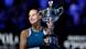 Aryna Sabalenka holds the trophy aloft Aryna Sabalenka holds the trophy aloft