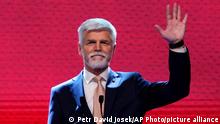 Czech Republic's President elect Petr Pavel greets his supporters after announcement of the preliminary results of the presidential runoff in Prague, Czech Republic, Saturday, Jan. 28, 2023. (AP Photo/Petr David Josek)