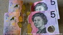 Australian $5 notes are pictured in Sydney, Saturday, Sept. 10, 2022. As the United Kingdom's reigning monarch, Queen Elizabeth II was depicted on British bank notes and coins for decades. It's less well known that her portrait was featured on currencies in dozens of other places around the world, in a reminder of the British empire's colonial reach. (AP Photo/Mark Baker)