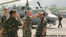ARCHIV 23.04.2002+++ 404355 03: U.S. Troops Brief A Filipino Soldier On The Night Flying Capabilities Of U.S. Helicopters April 23, 2002 At The Philippine Air Force Base In Clark In Angeles City In The Philippines. The Troops Will Be Holding Military Exercises For A Two Weeks On The Main Filipino Island Of Luzon Begining April 29. The U.S. Military Are Also Conducting Simultaneous Exercises In The South Of The County Training The Filipino Troops To Help Them In Their Fight Against Muslim Guerrillas Who Reportedly Have Links To The Al Qaeda Terrorist Network. (Photo By Gabriel Mistral/Getty Images)