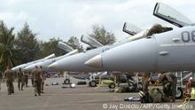 ARCHIV 12.10.2006+++ Angeles, PHILIPPINES: US marine air craft personel inspect and refuel F-18 hornets from the US Marine Fighter Attack Squadrons 122 as it lands in Clark Air Base a formerUS base 12 October 2006 from Iwakuni Japan, to join a two-week joint military training exercise with Filipino counterparts Dub as Talon Vision 2007. The Philippines is a non-NATO ally of the United States and is a key partner in Washington's so called fight against terrorism. AFP PHOTO/Jay DIRECTO (Photo credit should read JAY DIRECTO/AFP via Getty Images)