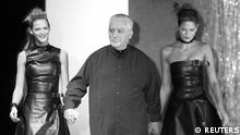 FILE PHOTO: Designer Paco Rabanne appears with his models at the end of his Spring/Summer 2001 ready-to-wear show in Paris 9 October 2000. STR New/File Photo