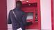 A man at an ATM
A man at an ATM