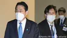 12.12.2022 *** Senior aide to the prime minister Masayoshi Arai, right, walks next to Prime Minister Fumio Kishida at the Prime Minister's official residence in Tokyo, Dec. 12, 2022. Kishida told reporters Saturday, Feb. 4, 2023, that Arai was being dismissed after making discriminatory remarks about LGBTQ people. (Kyodo News via AP)