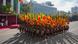 Sri Lankan government soldiers march carrying national flags during the 75th Independence Day ceremony in Colombo Sri Lankan government soldiers march carrying national flags during the 75th Independence Day ceremony in Colombo