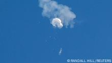 04/02/2023 The suspected Chinese spy balloon drifts to the ocean after being shot down off the coast in Surfside Beach, South Carolina, U.S. February 4, 2023. REUTERS/Randall Hill TPX IMAGES OF THE DAY 