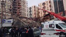 Rescue workers and medical teams try to reach trapped residents in a collapsed building following an earthquake in Diyarbakir, southeastern Turkey, early Monday, Feb. 6, 2023. A powerful earthquake has caused significant damage in southeast Turkey and Syria and many casualties are feared. Damage was reported across several Turkish provinces, and rescue teams were being sent from around the country. (AP Photo/Mahmut Bozarsan)