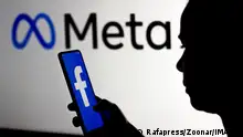 March 16, 2022, Brazil. In this photo illustration, a woman holds a smartphone with the Facebook logo displayed on the screen with the Meta Platforms logo displayed in the background. March 16, 2022, Brazil. In this photo illustration, a woman holds a smartphone with the Facebook logo displayed on the screen with the Meta Platforms logo displayed in the background Copyright: xZoonar.com/Rafapressx zoonar_18414406 ,model released, Symbolfoto ,property released