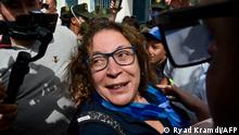 Archiv 2020*****Amira Bouraoui, one of the most prominent if not the best-known figure of Hirak, is greeted upon her release from prison on July 2, 2020, outside the Kolea Prison near the city of Tipasa, 70km west of the capital Algiers. (Photo by RYAD KRAMDI / AFP)