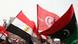 Egyptians wave flags of Egypt (L) Tunisia (C) and an old Libyan flag Egyptians wave flags of Egypt (L) Tunisia (C) and an old Libyan flag