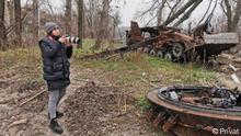 MediaFit partner Vchasno photographer takes photos of old military equipment