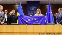 09.02.2023
European Parliament President Roberta Metsola and Ukrainian President Volodymyr Zelenskiy hold the EU flag at the European Parliament, during Zelenskiy's second international trip since Russia's invasion of Ukraine, in Brussels, Belgium February 9, 2023. Alain Rolland/Pool via REUTERS