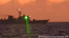 This handout photo taken on February 6, 2023 and released by the Philippine Coast Guard on February 13 shows a Chinese Coast Guard vessel shining a military grade laser light at a Philippine Coast Guard boat nearly 20 kilometres (12 miles) from Second Thomas Shoal, in the Spratly Islands in the disputed South China Sea. - The Philippine Coast Guard on February 13 accused a Chinese vessel of shining a military-grade laser light at one of its boats in the disputed South China Sea, temporarily blinding members of the crew. (Photo by Handout / Philippine Coast Guard (PCG) / AFP) / -----EDITORS NOTE --- RESTRICTED TO EDITORIAL USE - MANDATORY CREDIT AFP PHOTO / PHILIPPINE COAST GUARD - NO MARKETING - NO ADVERTISING CAMPAIGNS - DISTRIBUTED AS A SERVICE TO CLIENTS