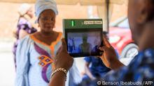Independent National Electoral Commission (INEC) officials registering voters during a mock accreditation exercise organised by the INEC at Somolu in Lagos, Nigeria on February 4, 2023. - The INEC held a mock accreditation exercise of voters to test the functionality of the Bi-Modal Voter Accreditation System (BIVAS) ahead of the 2023 general election in Nigeria. (Photo by Benson Ibeabuchi / AFP)