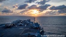 Handout photo dated February 4, 2023 shows The aircraft carrier USS Nimitz (CVN 68) transits the South China Sea. Nimitz is in U.S. 7th Fleet conducting routine operations in South China Sea. The Navy and Marine Corps are holding joint exercises in the South China Sea at a time of heightened tensions with Beijing over the shooting down of a suspected Chinese spy balloon. The 7th Fleet based in Japan said Sunday that the aircraft carrier Nimitz and its carrier strike group, as well as the 13th Marine Expeditionary Unit, have been conducting âintegrated expeditionary strike force operationsâ in the South China Sea. U.S. Navy photo by Mass Communication Specialist 2nd Class David Rowe via ABACAPRESS.COM