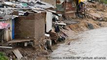 13/02/2023 A man looks on from a squatter camp on the edge of the Jukskei river by Alexandra township after heavy rain fall, in Johannesburg, South Africa, Monday, Feb. 13, 2023. (AP Photo/Themba Hadebe)