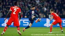 14/02/2023 Soccer Football - Champions League - Round of 16 First Leg - Paris St Germain v Bayern Munich - Parc des Princes, Paris, France - February 14, 2023 Paris St Germain's Lionel Messi in action with Bayern Munich's Joshua Kimmich REUTERS/Christian Hartmann