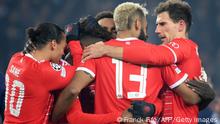 Bayern Munich's players celebrate after scoring team's first goal during first leg of the UEFA Champions League round of 16 football match between Paris Saint-Germain (PSG) and FC Bayern Munich at the Parc des Princes stadium in Paris on February 14, 2023. (Photo by FRANCK FIFE / AFP) (Photo by FRANCK FIFE/AFP via Getty Images)