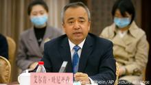 In this April 22, 2021, photo, Erkin Tuniyaz speaks during a press conference in Urumqi in northwestern China's Xinjiang Uyghur Autonomous Region. Erkin Tuniyaz was appointed the acting chairman of the regional government of Northwest China's Xinjiang Uyghur Autonomous Region on Thursday, Sept. 30, 2021, replacing Shohrat Zakir. (AP Photo/Mark Schiefelbein)