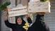 امرأة تحمل صندوقا مليئا بالخضار ومواد غذائية في القاهرة 25.01.2023