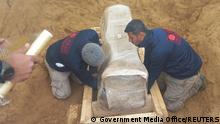 A team of archeological experts and workers, preserve a newly-discovered Roman coffin in a wooden box at the site of a 2000-year-old Roman cemetery in northern Gaza Strip February 14, 2023. Government Media Office/Handout via REUTERSÊÊATTENTION EDITORS - THIS IMAGE WAS PROVIDED BY A THIRD PARTY. NO RESALES. NO ARCHIVES.