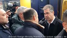 16.02.2023***KYIV, UKRAINE - FEBRUARY 16: (----EDITORIAL USE ONLY - MANDATORY CREDIT - 'ISRAELI FOREIGN MINISTRY / HANDOUT' - NO MARKETING NO ADVERTISING CAMPAIGNS - DISTRIBUTED AS A SERVICE TO CLIENTS----) Israeli Foreign Minister Eli Cohen (C) is welcomed upon his arrival as he set to attend the reopening of the Israeli Embassy in Kyiv, Ukraine on February 16, 2023. This is the first high-level visit by an Israeli official since the beginning of Russia-Ukraine war. Israeli Foreign Ministry / Handout / Anadolu Agency