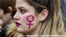 March 8, 2018 - Barcelona, Catalonia, Spain - A girl protester seen with the female symbol painted on her face. More than five million people supported the feminist strike throughout Spain on international women's day. In Barcelona more than 200,000 people has been demonstrating for the equality of women in the international women's day