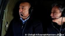 U.S. Secretary of State Antony Blinken, right, and Turkish Foreign Minister Mevlut Cavusoglu sit in a helicopter for a tour of earthquake stricken areas, Turkey, Sunday, Feb. 19, 2023. (Clodagh Kilcoyne/Pool Photo via AP)