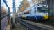 A regional train in Fonciello, Spain A regional train in Fonciello, Spain