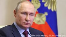 Russia's President Vladimir Putin takes part in the opening ceremony of new hospitals in Russian regions via a video link at a residence outside Moscow, Russia, February 15, 2023. Sputnik/Mikhail Metzel/Pool via REUTERS ATTENTION EDITORS - THIS IMAGE WAS PROVIDED BY A THIRD PARTY.