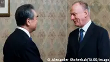 RUSSIA, MOSCOW - FEBRUARY 21, 2023: Wang Yi L, Director of the Office of the Foreign Affairs Commission of the Communist Party of China CPC Central Committee, and Russian Security Council Secretary Nikolai Patrushev shake hands during a meeting at Metropol Hotel Moscow. Alexander Shcherbak/TASS PUBLICATIONxINxGERxAUTxONLY 57478336