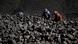 Workers sort coal near a coal mine Workers sort coal near a coal mine