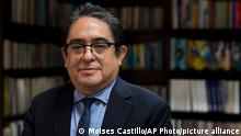 Guatemalan Ombudsman Jordan Rodas poses for photos during an interview, days before to leaves office due to his term coming to an end, in Guatemala City, Wednesday, Aug. 17, 2022. (AP Photo/Moises Castillo)