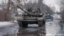 21.02.2023
Ukrainian service members ride tanks, as Russia's attack on Ukraine continues, near the frontline town of Bakhmut, Donetsk region, Ukraine February 21, 2023. REUTERS/Alex Babenko