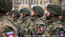 24/02/2023 Ukrainian soldiers line up during commemorative event on the occasion of the Russia Ukraine war one year anniversary in Kyiv, Ukraine, Friday, Feb. 24, 2023. (Ukrainian Presidential Press Office via AP)