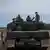 Soldados ucranianos en un tanque Leopard.