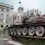Подбитый российский танк у посольства РФ в Германии