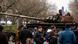 People gather around a damaged Russian tank on show near the site of Russia's embassy in Berlin. February 24, 2023. People gather around a damaged Russian tank on show near the site of Russia's embassy in Berlin. February 24, 2023.