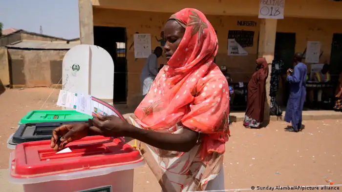 A woman casts her vote during Nigeria's 2023 presidential elections.