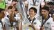 Eintracht Frankfurt's Daichi Kamada holds the Europa League trophy, surrounded by his teammates Eintracht Frankfurt's Daichi Kamada holds the Europa League trophy, surrounded by his teammates