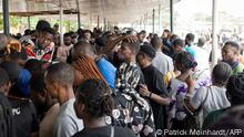Voters queue at Nnamdi Azikiwe University polling station in Awka on February 25, 2023, during Nigeria's presidential and general election. (Photo by Patrick Meinhardt / AFP)