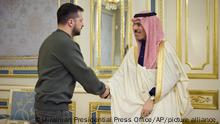 26.02.2023**In this photo made available by the Ukrainian Presidential Press Office, Ukrainian President Volodymyr Zelenskyy, left, and Saudi Arabia's Minister of Foreign Affairs Prince Faisal bin Farhan al-Saud shake hands during their meeting in Kyiv, Ukraine, Sunday, Feb. 26, 2023. (Ukrainian Presidential Press Office via AP)