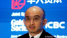 FILE PHOTO: Fan Bao, founder, Chairman and CEO of China Renaissance Group, an investment bank led by one of the country’s most famed rainmakers, holds a news conference on its IPO in Hong Kong, China September 13, 2018. REUTERS/Bobby Yip/File Photo