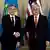 US Secretary of State Antony Blinken, left, shakes hands with Kazakhstan's President Kassym-Jomart Tokayev