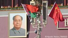 Belarusian, Chinese flags in Beijing A Belarusian left flag flies with a Chinese flag in front of Tiananmen Square in Beijing on Feb. 28, 2023, to mark Belarusian President Alexander Lukashenko s visit to China. PUBLICATIONxINxGERxSUIxAUTxHUNxONLY A14AA0001400879P